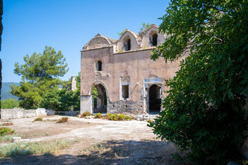 Fototapeta na wymiar Ruins of old abandoned church in the ghost town of Kayakoy. Kayakoy is abandoned Greek village in Fethiye district, Turkey.