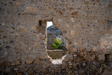 The wall of the old abandoned house in the ghost town Kayakoy. Kayakoy is abandoned Greek village in Fethiye district, Turkey.