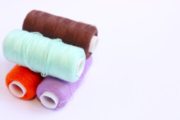 Spools Of Sewing Thread On White Background 1
