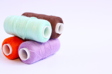 Spools Of Sewing Thread On White Background 2