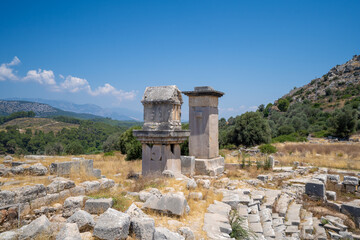 Fototapeta na wymiar Harpy tomb and the pillared sarcophagus in Xanthos ancient city. Xanthos was a centre of culture and commerce for the Lycians.
