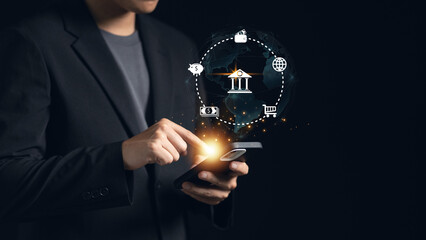 Businessman pointing to a hologram online banking icon set, representing finance, technology, and secure digital banking services. Business and financial concept