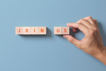 Job recruiting advertisement. represented by 'JOIN US' texts on the block.