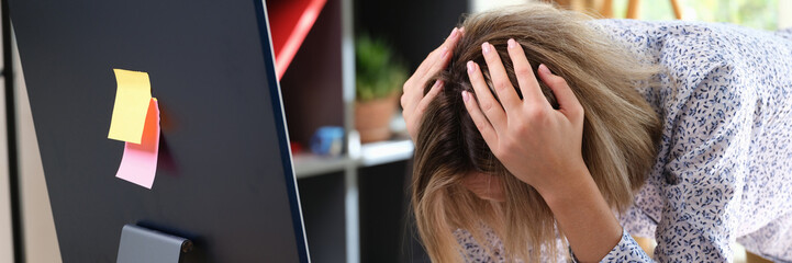 Fototapeta premium Employee suffers because of mistake and problems at work in office.