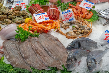 Beautiful display of fresh fish and seafood seen at a market in Barcelona, Spain