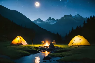 Fotobehang Summer camping in the mountains. Tents in the night with the starry sky and clouds in the background. © birdmanphoto