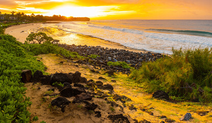Sunrise on The Rocky Shoreline of Shipwreck Beach, Kauai, Hawaii, USA