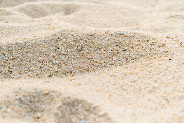 Fototapeta na wymiar Close-up of sand on the beach in the summer time.