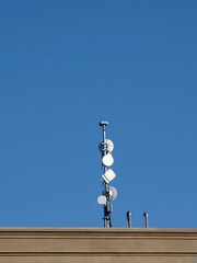 Communications antennae on a high rooftop