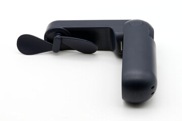 Mini Manual Fan isolated on white background.