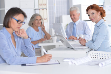 business people working at desk in office