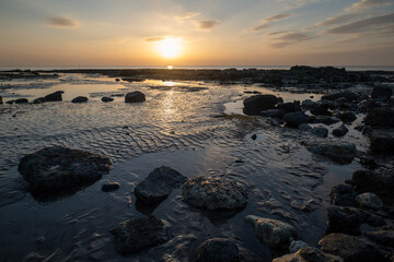 Naklejka premium sunset on the beach