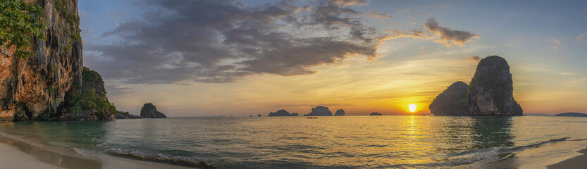 Tropical islands sunset view with ocean sea water at Phra Nang Cave Beach, Krabi Thailand nature landscape panorama