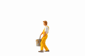 Miniature people, Painter holding paint bucket on white background with clipping path
