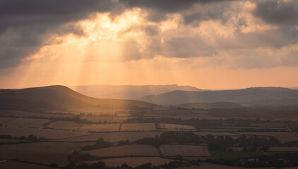 Waiting for sunset over Firle beacon from Wilmington Hill on the south downs east Sussex south east England UK