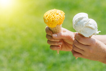 Refreshing ice cream in waffle cones with lemon flavour