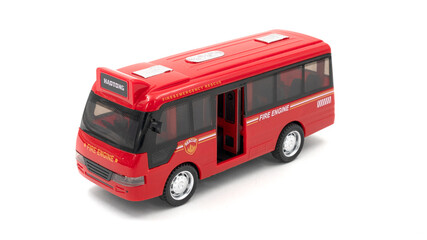 Fototapeta na wymiar Red plastic bus toy isolated on white background