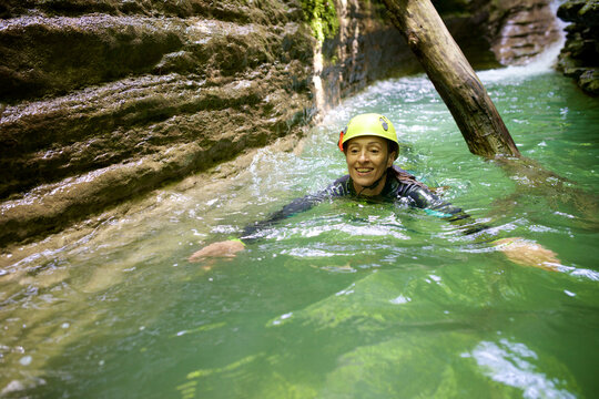 Woman canyoneering in Furco Canyon in Spanish Pyrenees