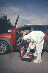 Crime scene investigation - investigation and collecting of evidences in car with dead man