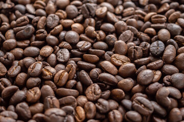 Fresh roasted brown coffee beans background
