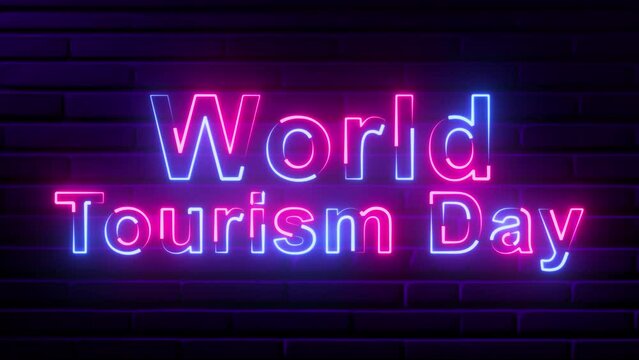 Glowing neon World Tourism Day text animation ,blue and pink color neon sign .