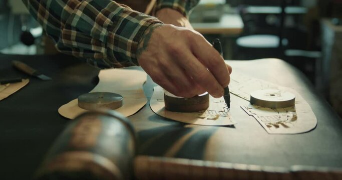 Craftsman is preparing his professional tools for work at the workshop.