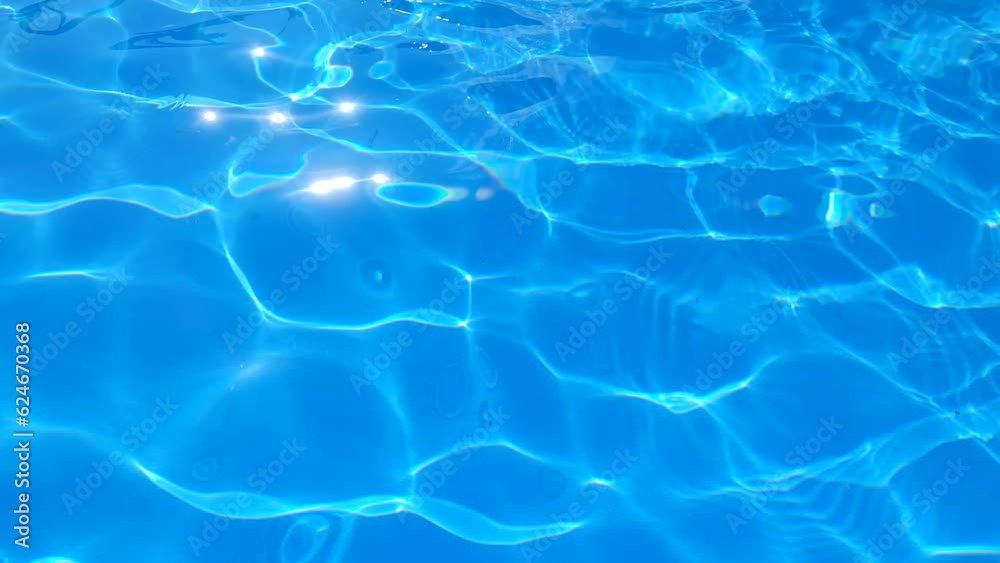 Canvas Prints Blue water in the pool with sun glare.