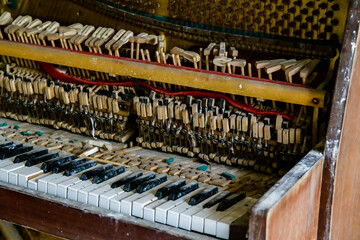 Old broken piano in abandoned apartment at the ghost town Pripyat. Chernobyl exclusion zone