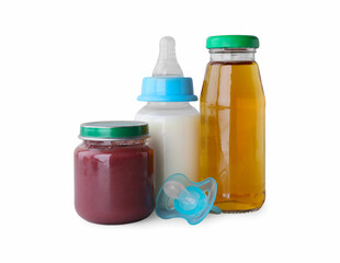 Healthy baby food, bottles with juice, milk and pacifier on light grey background