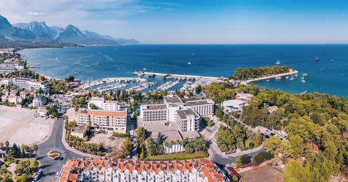 the essence of Kemer resort town, Turkey's coastal charm with our breathtaking aerial image showcasing its scenic landscapes and vibrant blue waters.