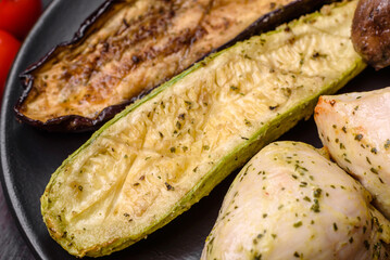 Delicious grilled vegetables zucchini, eggplant, peppers and mushrooms with salt, spices and herbs