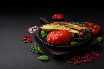 Delicious grilled vegetables zucchini, eggplant, peppers and mushrooms with salt, spices and herbs