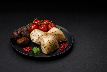 Delicious juicy grilled chicken with salt, spices and herbs with vegetables