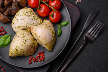 Delicious juicy grilled chicken with salt, spices and herbs with vegetables