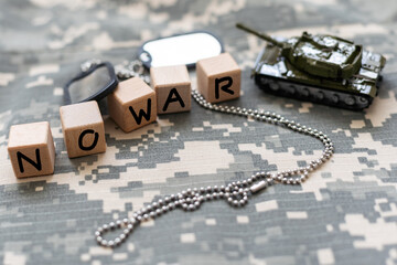 Cubes with the inscription: No to war. Black background.