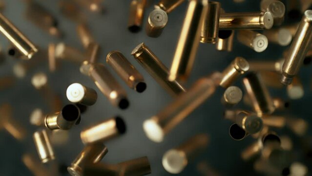 Super Slow Motion Shot of Used Real Gun Bullets Flying Towards Camera at 1000fps.