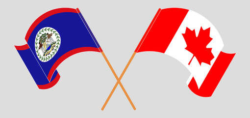 Crossed and waving flags of Belize and Canada
