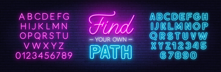 Obraz premium Find Your Own Path neon lettering on brick wall background.