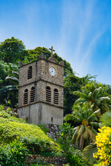 Mahe Seychelles 16.07.2023 Clock tower behind the immaculate conception cathedral, build in 1936,...