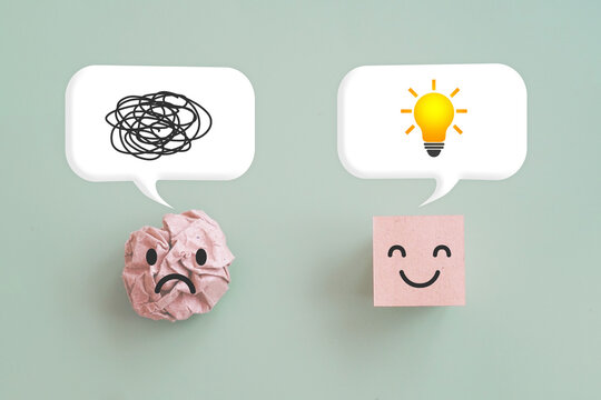unhappy face on crumpled paper and happy on smooth with a tangle of thoughts and brighten lightbulb on white speech bubble, for creative, solution, problem solving concept