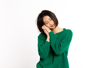 Asian Woman with closed eyes resting sleepy expression on a white background