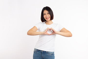 Asian woman feeling happy and romantic heart gesture showing tender feelings On white background,  concept of love and caring people