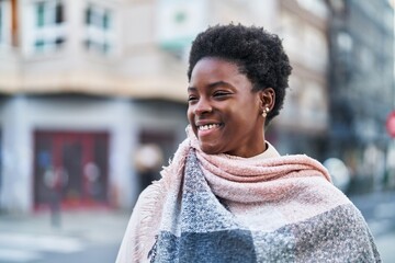 African american woman smiling confident standing at street