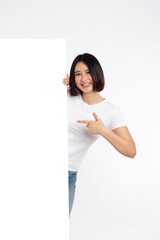 Smiling asian woman presenting something on white blank board with empty space isolated on white background, Awesome promo concept.