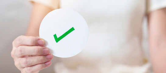 Woman show Right symbol paper. True and false, accept and rejected, evaluation, Vote, Poll, Yes or...