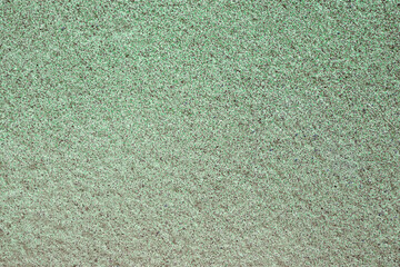 Abstract background on a cement wall.Abstract grunge background for design. Painted concrete wall with rough grainy plaster texture.