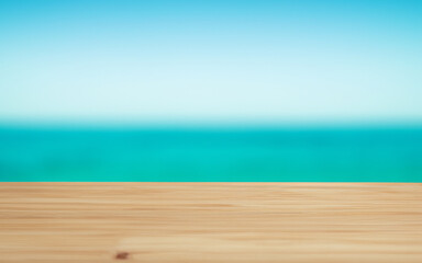 Wooden board empty table in front of blurred sea background
