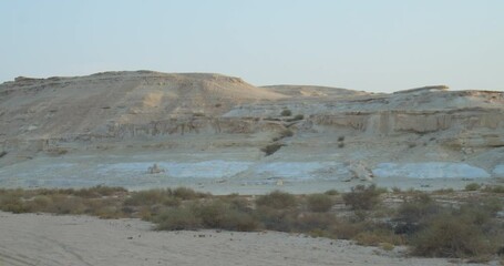 Panning shot of Wadi Al Buhair before urban and infrastructure development