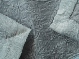 abric texture, material with visible weave and pattern, in light and shadow. background wallpaper for various projects