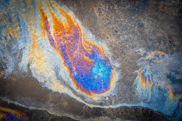 Naklejka premium Oil petrol water pollution. Ecological disaster. Slick industry oil fuel spilling water pollution.